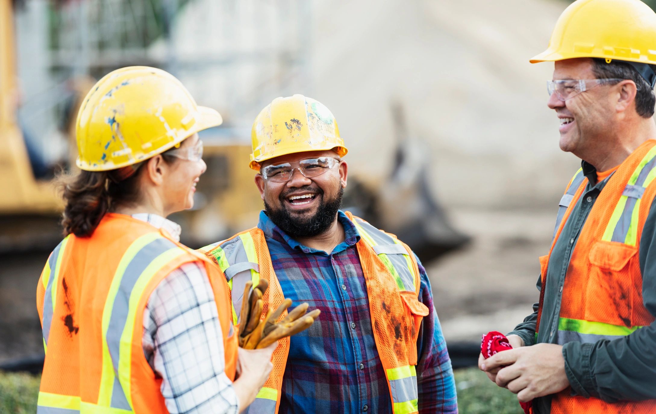 Construction workers wearing hard hats