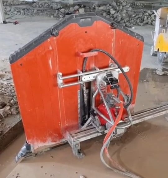 Saw cutting concrete blocks